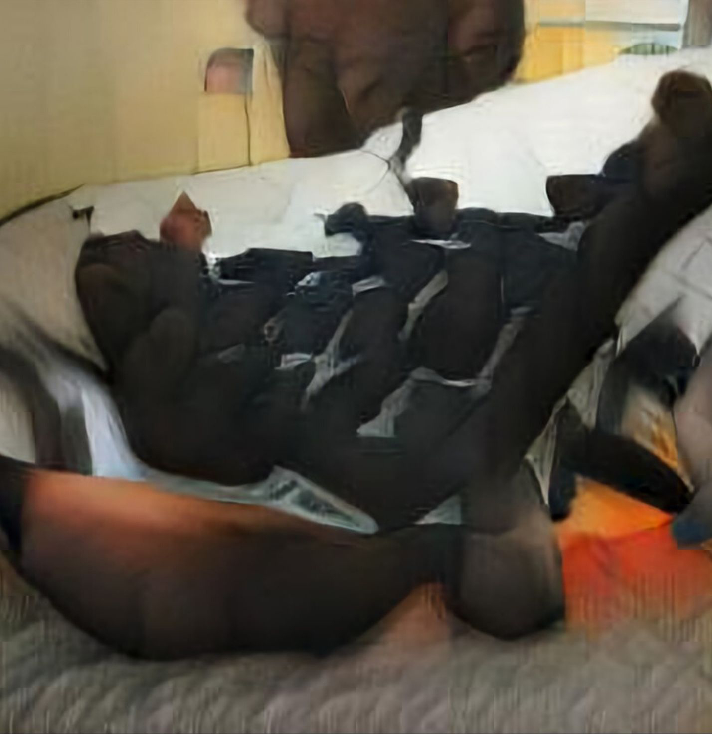 An AI Generated Artwork: A trans masculine gender-nonconforming person and a transfeminine non-binary person sleeping together in bed