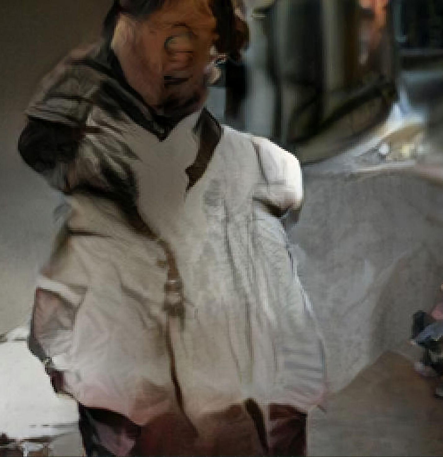 An AI generated Artwork: A masculine looking person looking out into the sunset.