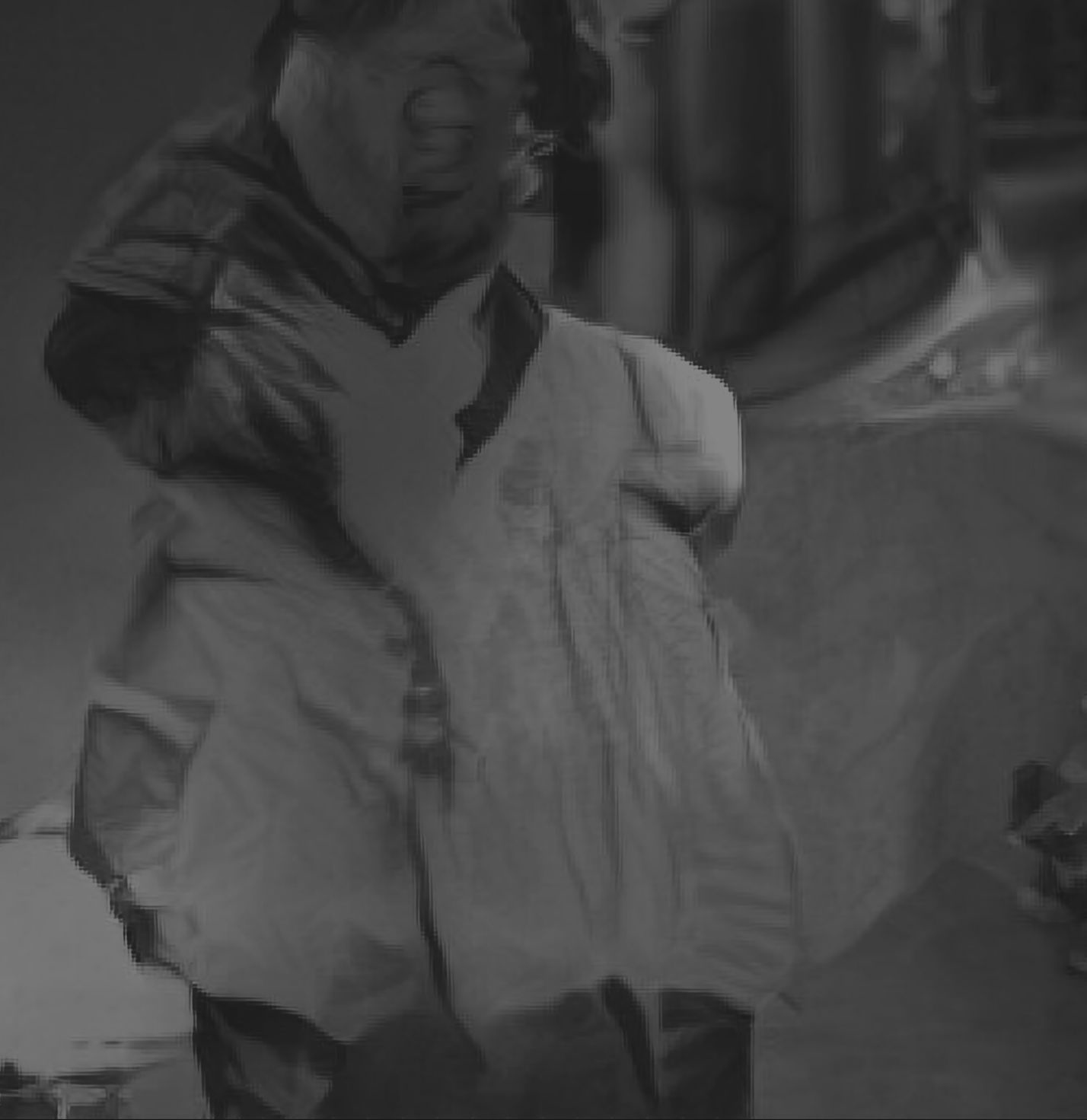 A new AI generated caption: A masculine looking person looking out into the sunset.