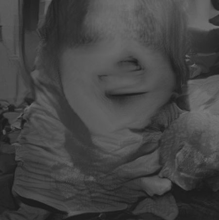 the same AI generated caption: A young girl is holding a teddy bear.